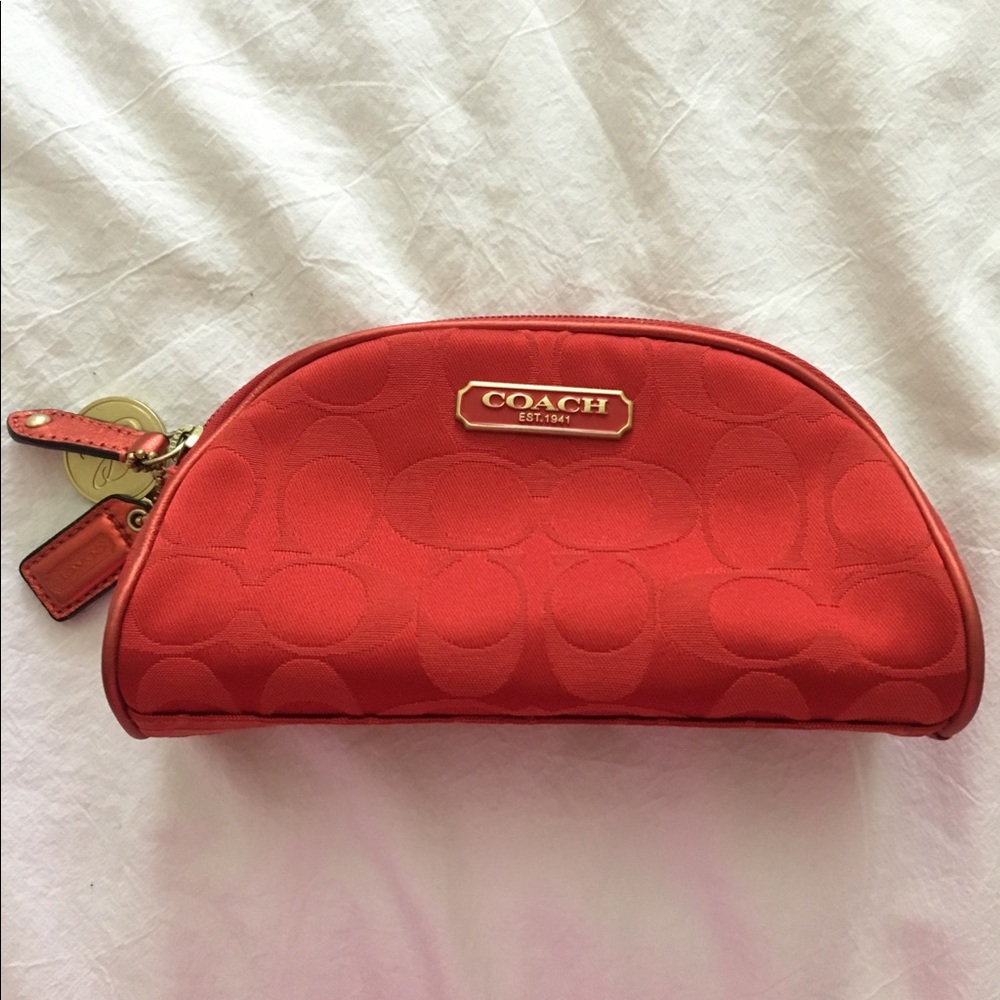 coach x estée lauder cosmetic bag